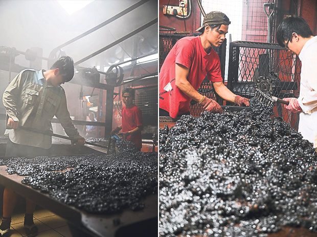Workers scooping coffee beans that have been roasted in margarine and sugar (left). The coffee beans are spread out to be dried (right)