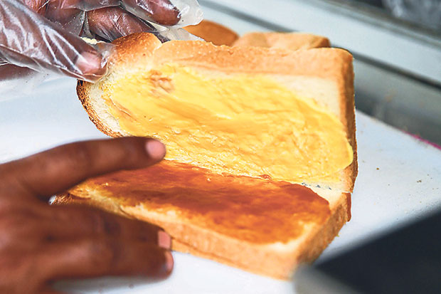 The classic combination for the original roti benggali is kaya and margarine