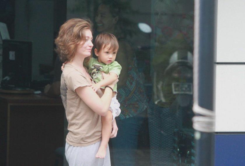 Sarah Joseph exits the Jalan Tun Razak police station after being reunited with her son, Freddie, who was found unhurt at Taman Tasik Titiwangsa, November 9, 2013. u00e2u20acu201d Picture by Choo Choy May
