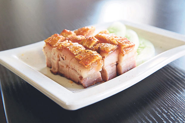 Crunchy glossy skin for Boon Signature Recipe’s siew yoke infused with English herbs