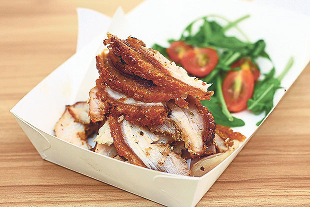 Crack Pork’s porchetta is filled with herbs like rosemary