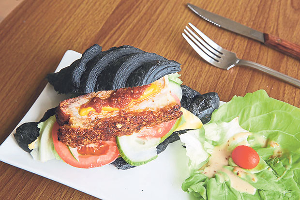The Black Pig at W Cafe was an impromptu sandwich combination by owner HanChoo with a slab of their signature siew yoke topped with mustard and sambal