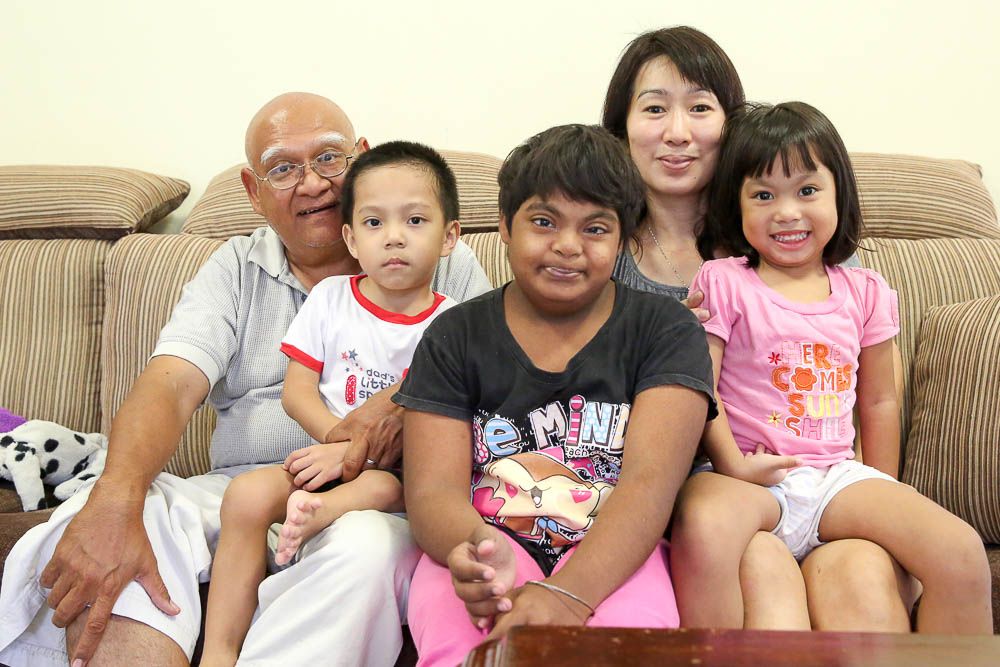 (From left, seated) Pastor Henry Martinus and his wife Serena Wong with Isaac, 5, Abigail,12, and Isabella, 4 u00e2u20acu201d Picture by Choo Choy May