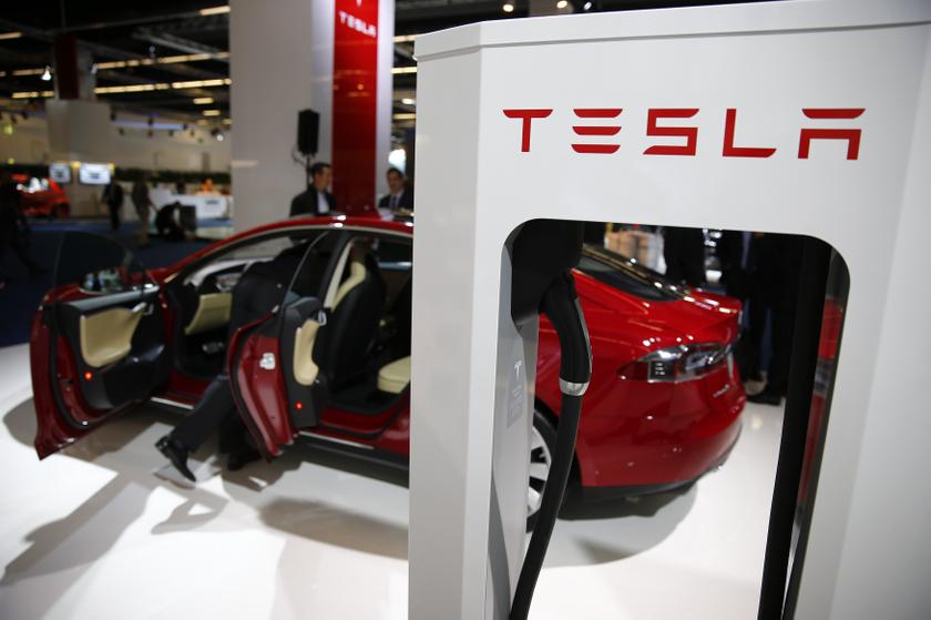 A Tesla model S car with an electric vehicle charging station is displayed during a media preview day at the Frankfurt Motor Show (IAA) September 10, 2013. u00e2u20acu201d Reuters pic