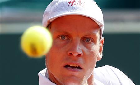 Tomas Berdych of the Czech Republic eyes the ball during his match against Marcel Granollers of Spain during the Monte Carlo Masters in Monaco April 17, 2013. u00e2u20acu201d Reuters pic