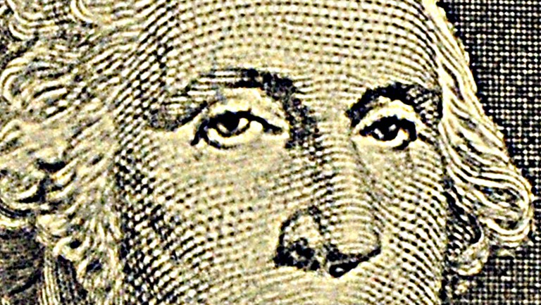 This March 29, 2009 photo illustration shows George Washington on the front of the US one dollar note in Washington, DC. u00e2u20acu201d AFP pic