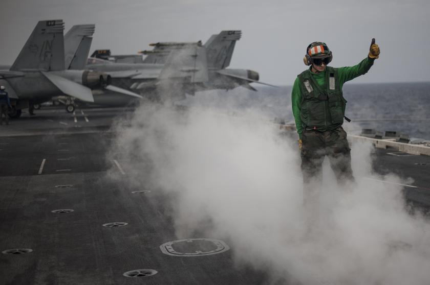 Aviation Boatswain's Mate 2nd Class Tyler Stives, from Spring, Texas, inspects a catapult after an aircraft launch aboard the aircraft carrier USS George Washington during Annual Exercise 2013, November 27, 2013. u00e2u20acu201d Reuters pic