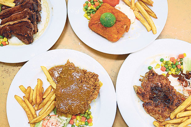 Grilled lamb loin, stuffed fish (top right), garlic chicken (bottom left) and grilled Bombay chicken (bottom right) at All Right! Western Food