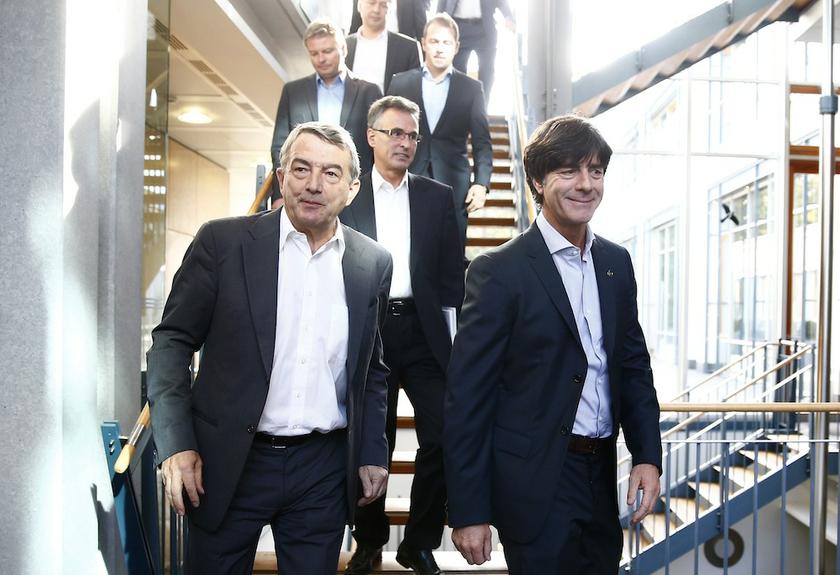 Wolfgang Niersbach (left) President of Germanyu00e2u20acu2122s football association (DFB) walks down the stairs next to German national football team coach Joachim Loew at the DFB headquarters in Frankfurt, October 18, 2013. u00e2u20acu201d Reuters pic