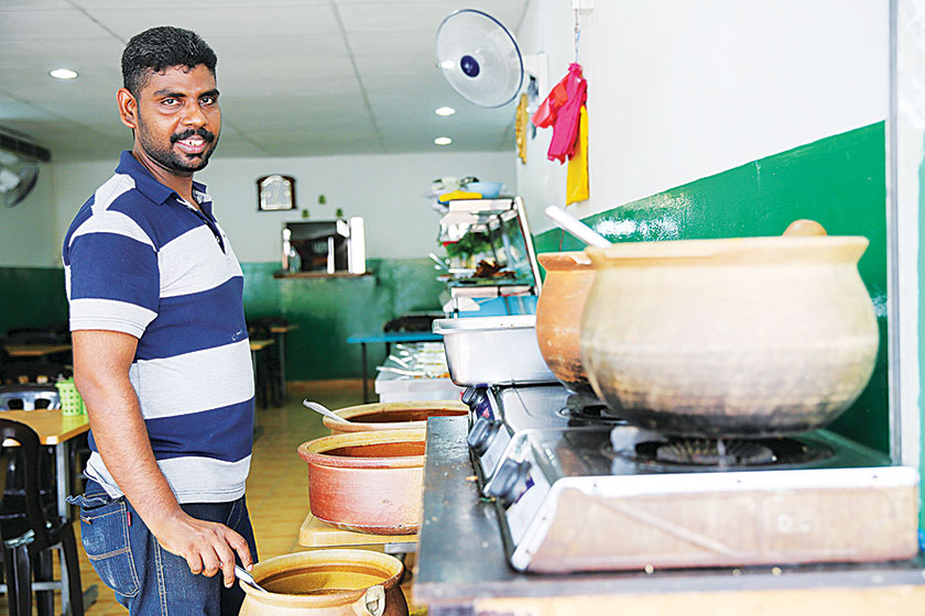 Owner N. Pratheephan with the lunch spread.