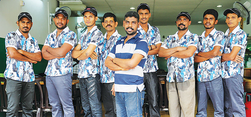 N. Pratheephan with his crew.