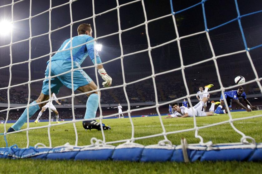 Italy's Mario Balotelli (right) heads the ball during their 2014 World Cup qualifying match against Armenia at San Paolo stadium in Naples October 15, 2013. — Reuters pic