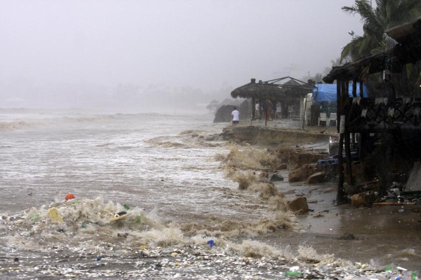 Hurricane Ingrid and tropical depression Manuel brought heavy rains to Mexico's Gulf and Pacific coasts on yesterday, causing flooding and landslides, Sept 16, 2013.  u00e2u20acu201d Reuters pic