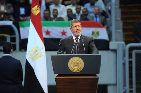 Egyptian President Mohammed Morsi gives his speech to thousands of islamists and Syrian opposition supporters during the