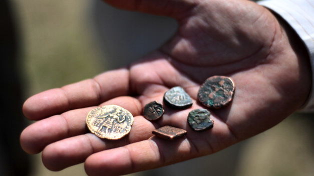 The Kilwa coins were discovered lying in the sand by Royal Australian Air Force radar operator Maurie Isenberg during World War II when he was stationed on the island as the Pacific conflict raged. u00e2u20acu201c AFP pic
