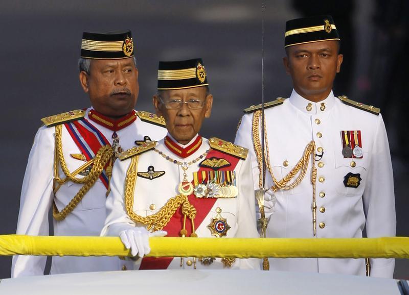 Malaysia's King Abdul Halim Mu'adzam Shah leaves the podium to inspect an honour guard during the king's birthday parade in Kuala Lumpur June 2, 2012. u00e2u20acu201d Reuters pic