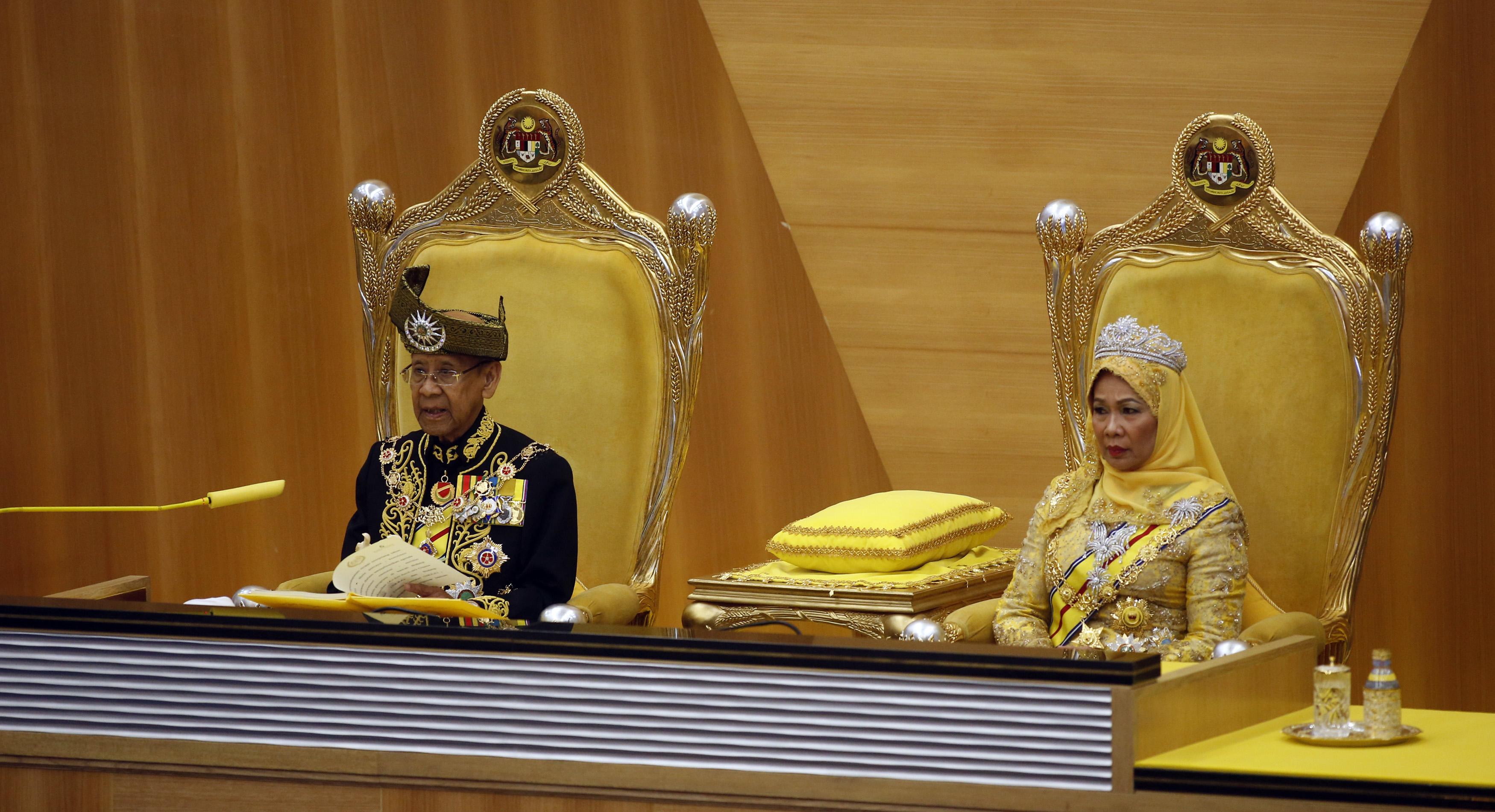 Malaysia's King Abdul Halim Mu'adzam Shah delivers his royal address next to Queen Haminah during the opening of the parliament sitting at Parliament House in Kuala Lumpur June 25, 2013. u00e2u20acu201c Reuters pic