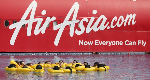 The logo of Malaysiau00e2u20acu2122s low-cost airline AirAsia Berhad is pictured on a structure as its staff undergo training at its academy in Sepang outside Kuala Lumpur September 13, 2013. u00e2u20acu201d Reuters pic