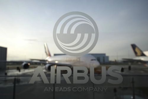 An A380 aircraft is seen through a window with an Airbus logo during the EADS/Airbus in Hamburg January 17, 2012. u00e2u20acu201d Reuters pic