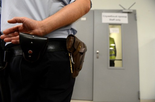 A police officer guards an entrance inside Moscowu00e2u20acu2122s Sheremetyevo airport terminal F on July 24, 2013. u00e2u20acu201d AFP pic