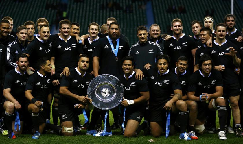 New Zealand's All Blacks pose with the trophy after beating England in their international rugby union match at Twickenham in London November 16, 2013. u00e2u20acu201d Reuters pic