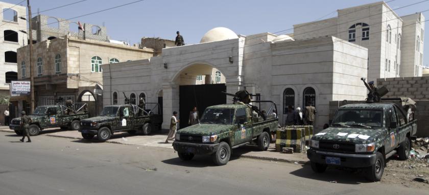 Soldiers in military vehicles are positioned outside the state security court where five Saudi citizens accused of being involved with al-Qaeda are standing trial, in Sanaa Sept 12, 2013. u00e2u20acu201d Reuters pic