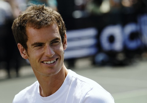 Wimbledon menu00e2u20acu2122s singles champion Andy Murray of Britain smiles as he gives an interview during a publicity event in Kennington, south London July 8, 2013. u00e2u20acu201d Reuters pic