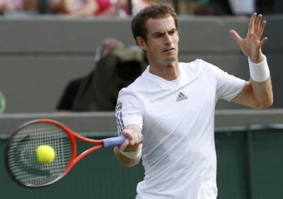 Andy Murray of Britain hits a return to Lu Yen-Hsun of Taiwan in their menu00e2u20acu2122s singles tennis match at the Wimbledon Tennis Championships in London on June 26, 2013. u00e2u20acu201d Reuters pic