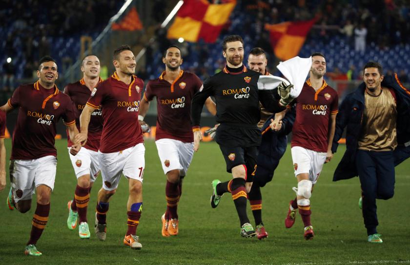 AS Roma's Francesco Totti (third left) celebrates with his teammates after winning their Italian Serie A match against Livorno at the Olympic stadium in Rome January 18, 2014. u00e2u20acu201d Reuters pic