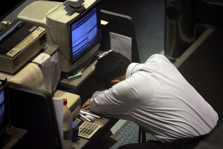 A broker takes a rest at the Stock Exchange in Jakarta, 23 January 2008. u00e2u20acu201d AFP pic