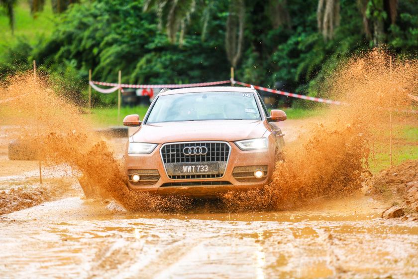 The Audi quattro Q3 is not deterred by mud nor water.