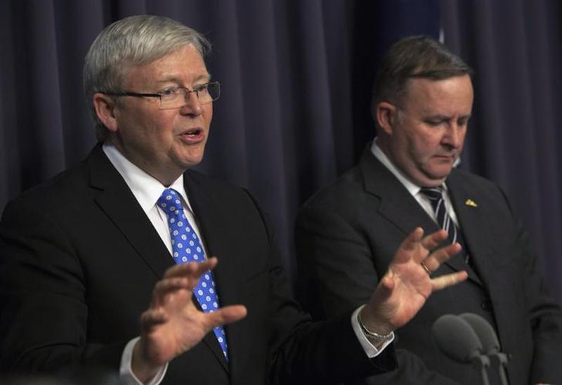 Australia's newly elected Prime Minister Kevin Rudd (L) gestures next to Anthony Albanese as he talks to the media after winning a Labor Party vote at Parliament House in Canberra June 26, 2013. 