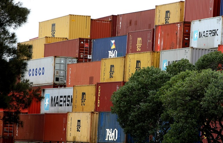 Containers are shown stacked at Port Botany's maritime dock near Sydney. u00e2u20acu201d AFP pic