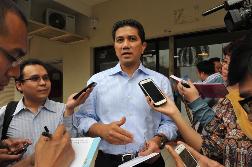 Azmin Ali speaking to reporters outside the PKR headquarters in Petaling Jaya on January 28, 2014.