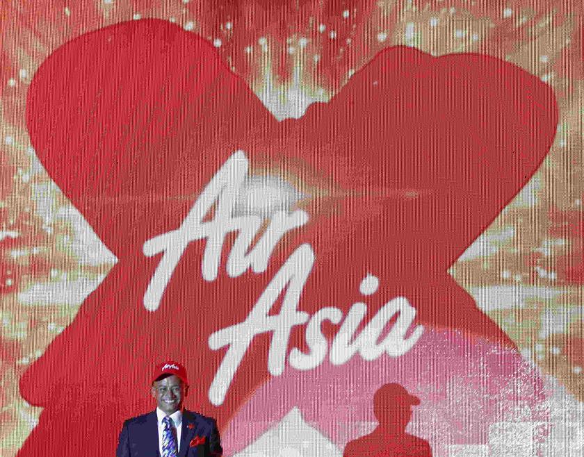 Azran Osman-Rani, chief executive officer of long-haul carrier AirAsia X, smiles during the launch of the companyu00e2u20acu2122s prospectus in Kuala Lumpur June 10, 2013. u00e2u20acu201d Reuters pic