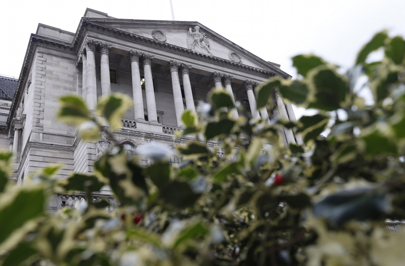 The Bank of England is seen behind holly bushes in the City of London March 15, 2013. u00e2u20acu201d Reuters pic