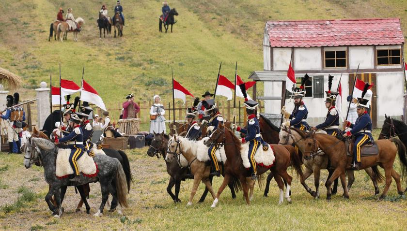 Performers wearing 19th century Allied forces military uniforms arrive to a reenactment of the Battle of the Nations, in a field in the village of Markkleeberg near Leipzig October 20, 2013. u00e2u20acu201d Reuters pic