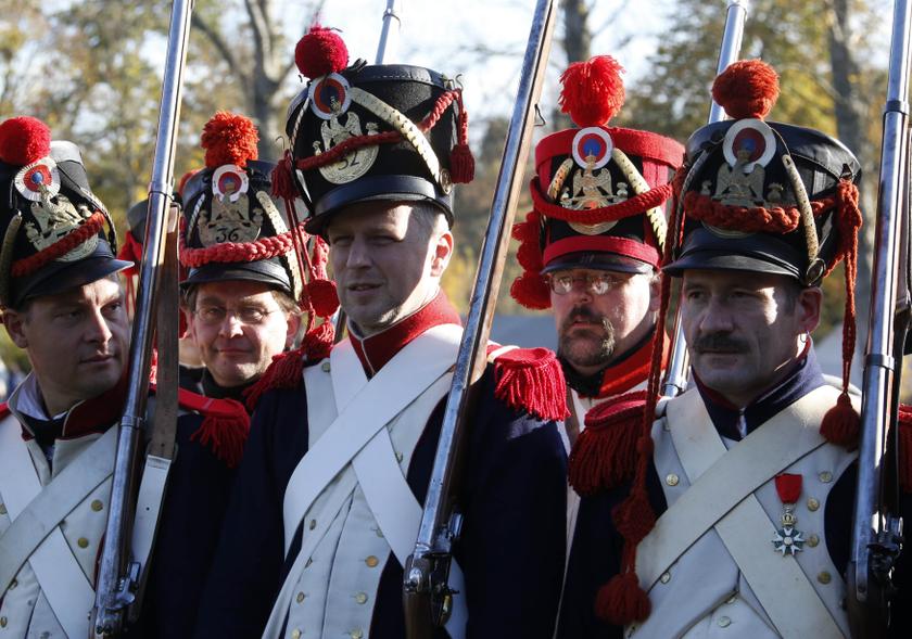 Performers wearing 19th century French military uniform practice for the reenactment of the Battle of the Nations.