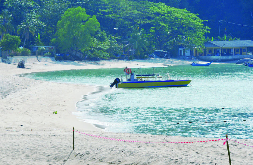 There was hardly any activity in the polluted stretch of beach in Batu Feringghi yesterday.