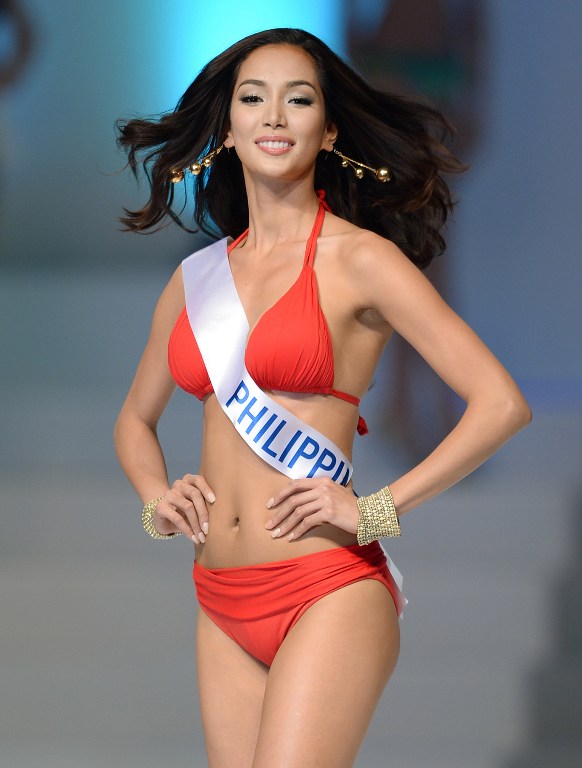 Bea Rose Santiago of the Philippines appears on the stage during the Miss International Beauty Pageant in Tokyo on December 17, 2013. — AFP pic