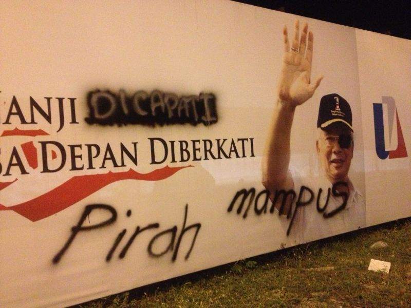 The defaced billboard bearing Prime Minister Datuk Seri Najib Razaku00e2u20acu2122s image. u00e2u20acu201d Picture courtesy of Zairil Khir Johari