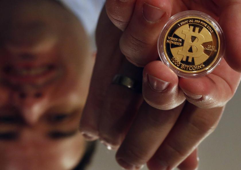 Bitcoin enthusiast Mike Caldwell poses in his office in Sandy, Utah, September 17, 2013. u00e2u20acu201d Reuters pic