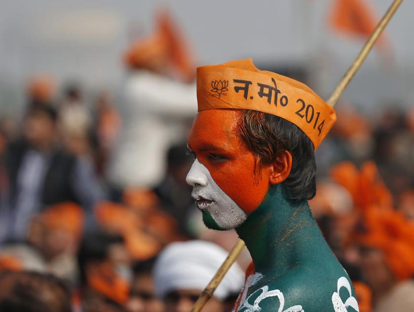 A supporter of India's main opposition Bharatiya Janata Party (BJP) attends a rally being addressed by Gujarat's Chief Minister and Hindu nationalist Narendra Modi, the prime ministerial candidate for BJP, ahead of the 2014 general elections, at Meerut in