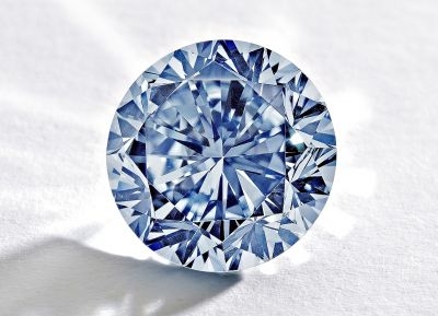 This handout picture taken on June 30, 2013 and released in Hong Kong by Sotheby's auction house on August 19, 2013 shows The Premier Blue diamond. u00e2u20acu201c AFP pic