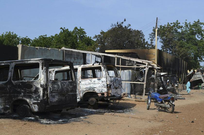 Burnt vehicles and houses are pictured on a street, after Boko Haram militants raided the town of Benisheik, west of Borno State capital Maiduguri September 19, 2013. u00e2u20acu201d Reuters pic