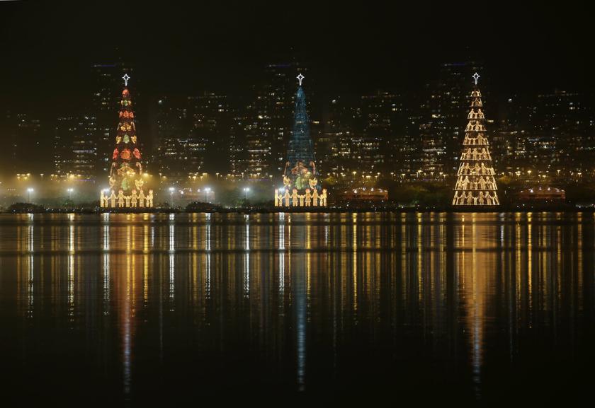 Lit Christmas trees are seen during a lighting ceremony at Rodrigo de Freitas Lake in Rio de Janeiro November 30, 2013. u00e2u20acu201d Reuters pic