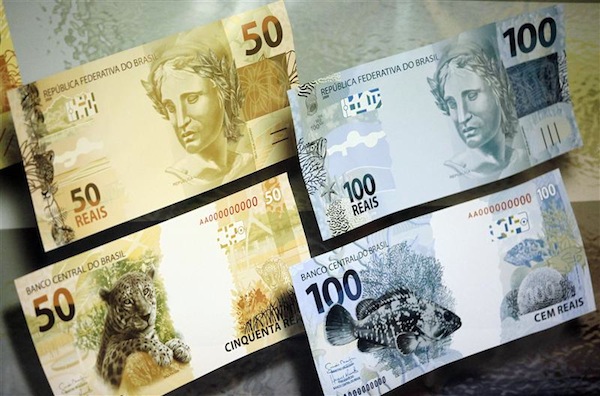 A banner with the new Brazilian real currency notes is seen during a presentation ceremony in Brasilia February 3, 2010. u00e2u20acu201d Reuters pic