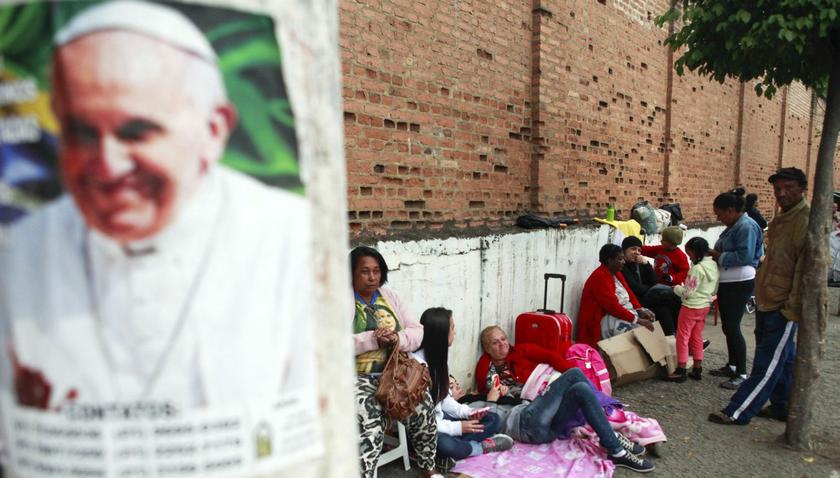 Catholic faithful line up in front of the Basilica of the National Shrine of Our Lady in Aparecida do Norte July 23, 2013. — Reuters pic