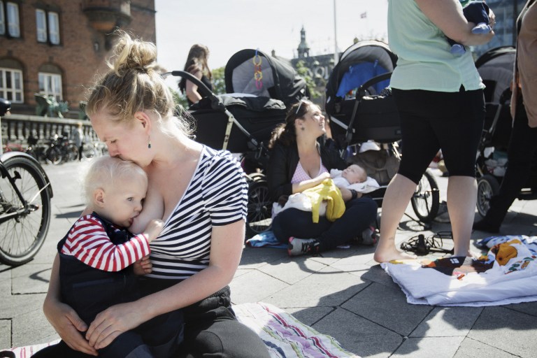 Women breastfeed their children at City Hall Square in Copenhagen on June 17, 2013 in protest against the ban on breastfeeding in some cafe's and places in Denmark. u00e2u20acu201c AFP pic