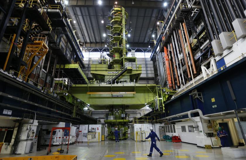 An employee walks through the charge hall inside EDF Energy's Hinkley Point B nuclear power station in Bridgwater, southwest England in this file photograph dated December 13, 2012. u00e2u20acu201d Reuters pic